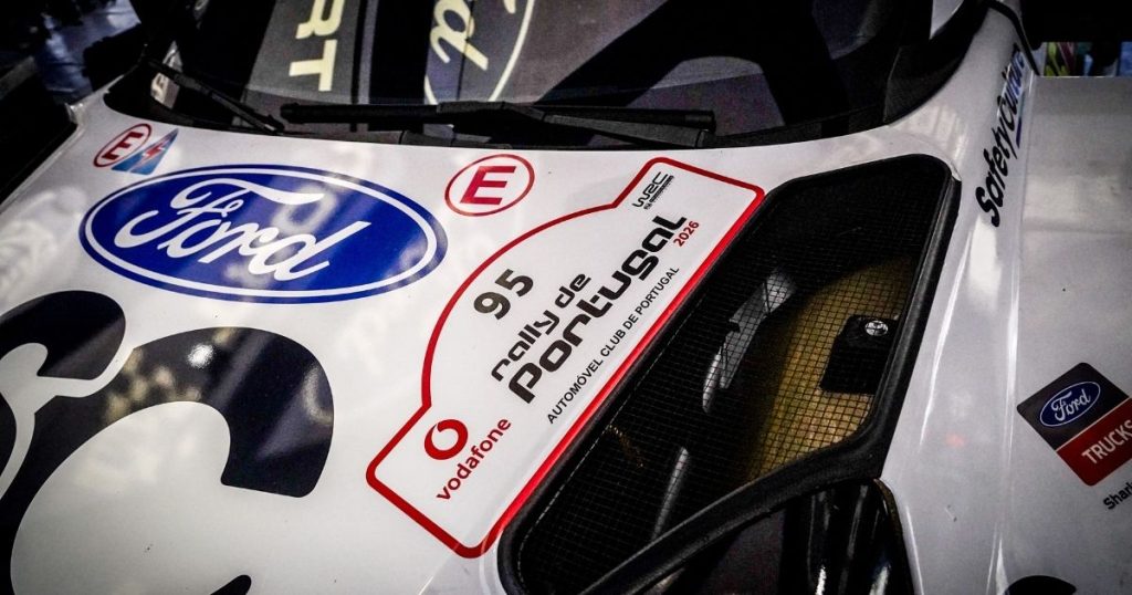 Ford car with rally event sticker no 95 for Jon Armstrong