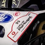 Ford car with rally event sticker no 95 for Jon Armstrong