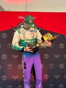 Jon Armstrong with his trophy at the Disney Pixar Cars display, Goodwood Festival of Speed 2026