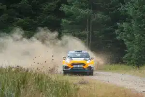 Jon Armstrong and Shane Byrne at speed in the M-Sport Ford Fiesta Rally2 on a forest stage at the Grampian Forest Rally 2026
