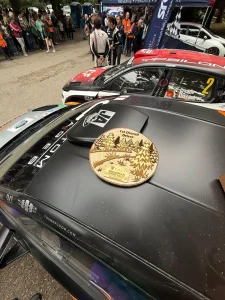 The Grampian Forest Rally 2026 winners' trophies on the bonnet of Jon Armstrong's M-Sport Ford Fiesta Rally2